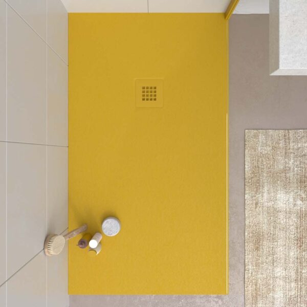 Base de duche em resina CLOE Amarelo Mel RAL 1005 com textura de ardósia antibacteriana e antiderrapante. Grelha termolacada